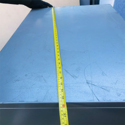 Side metal grey filing cabinet