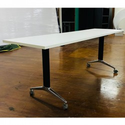 Rectangular wooden office desk with casters