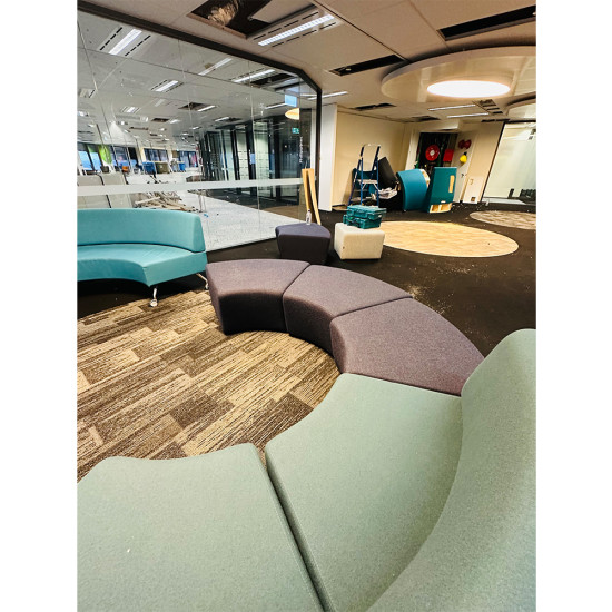 Zenith Mid Back Ottoman For Lounge Area In Good Condition